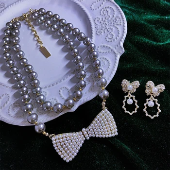 Vintage Temperament Klaasist pärl vibu ripats kaelakeed naiste Tüdruk partei kingitus Ehteid hulgimüük